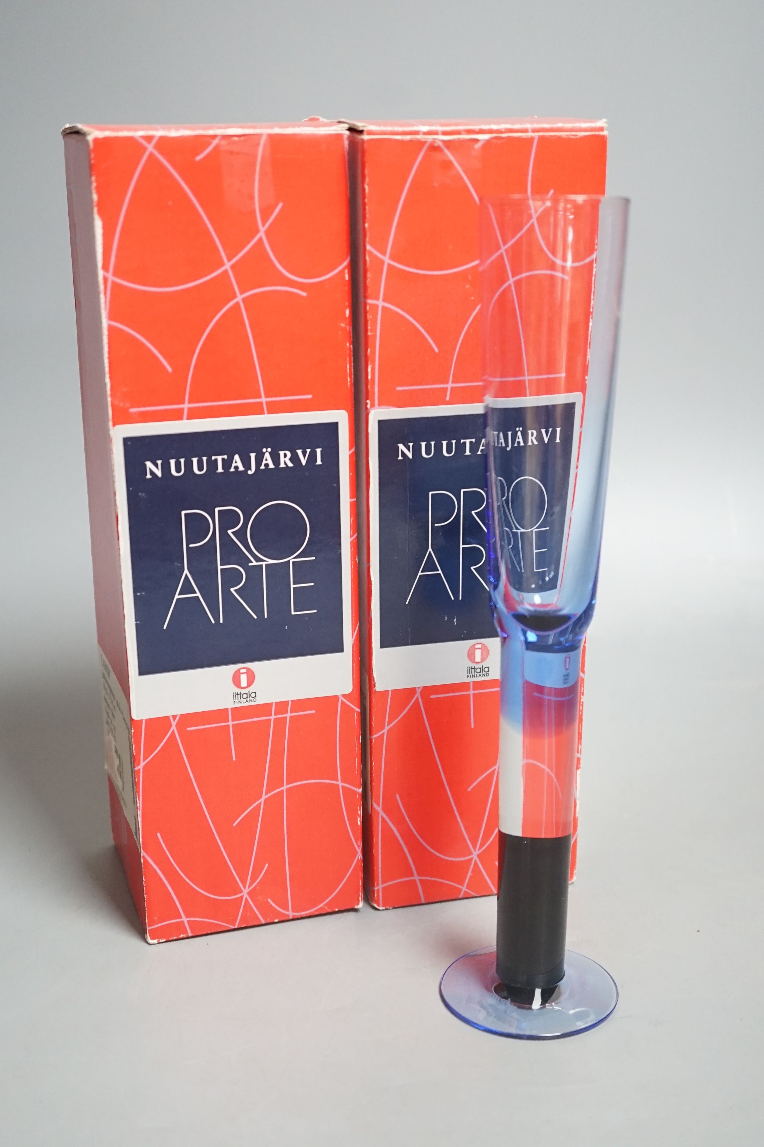 A pair of Ittala Lampi champagne flutes. Kerttu Nurminen for 200th Nuutajarvi anniversary - 25cm tall